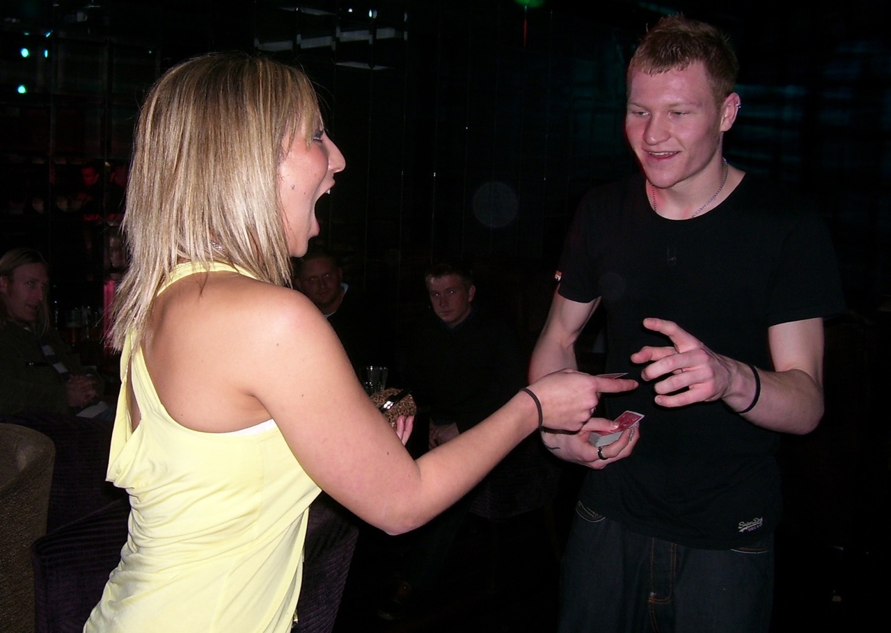 Street Magician Liam Walsh performing close up magic for Big Brother 8 Ziggy, Liam and Brian in Worthing at Liquid Lounge